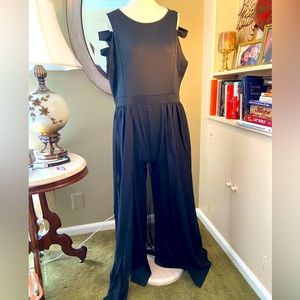 5X sleeveless black jumpsuit with chiffon over skirt